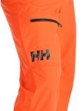 Miniatuur Helly Hansen, Sogn Cargo skibroek heren Cherry Tomato oranje 