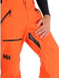 Miniatuur Helly Hansen, Sogn Cargo skibroek heren Cherry Tomato oranje 