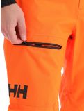 Miniatuur Helly Hansen, Sogn Cargo hardshell skibroek heren neon oranje 